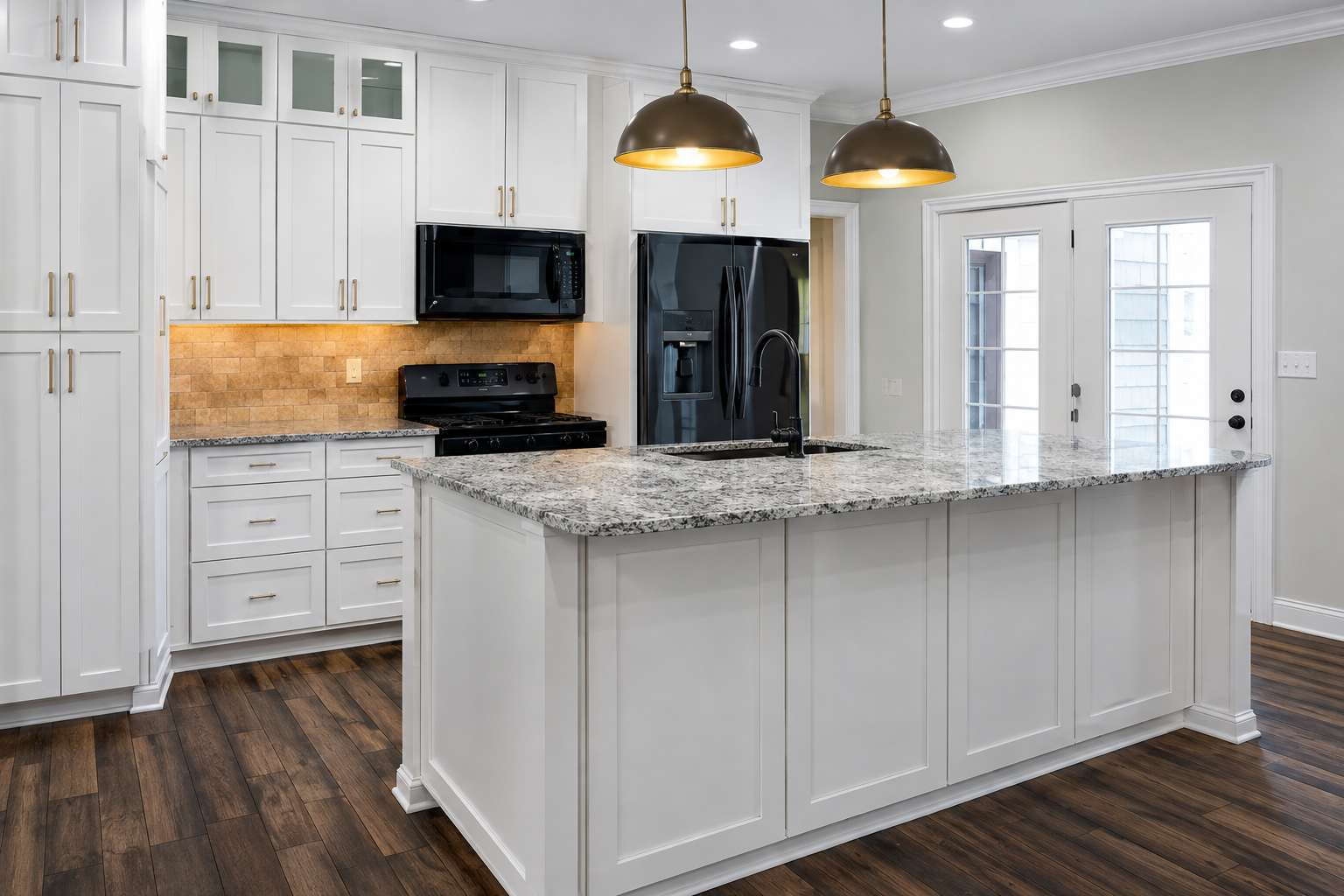 The kitchen after BMD's Custom Kitchen Renewal, with bright white cabinetry